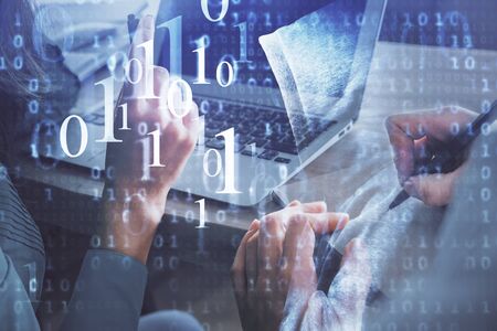 Double exposure of man and woman working together and technology theme drawing hologram. Big data concept. Computer background.の写真素材