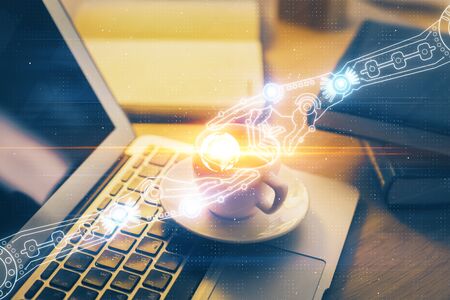 Double exposure of desktop computer and technology theme hologram. Concept of software development.の写真素材