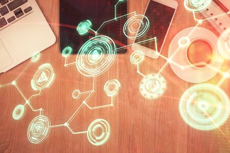 Double exposure of social network theme drawing over table with phone. Top view. People connecting concept.の写真素材