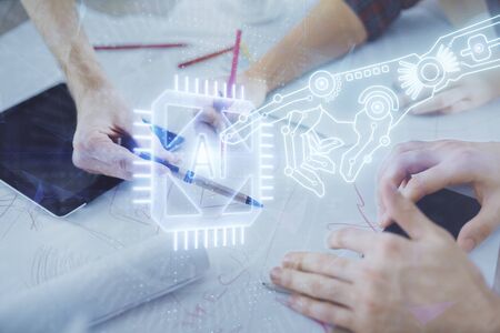 Double exposure of data theme hologram drawing and man and woman working together holding and using...