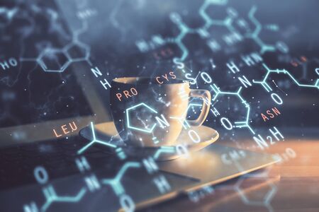 Desktop computer background and formula hologram writing. Double exposure. Education concept.の写真素材