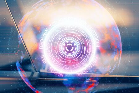 Computer on desktop in office with technology theme hologram. Multi exposure. Tech concept.の写真素材
