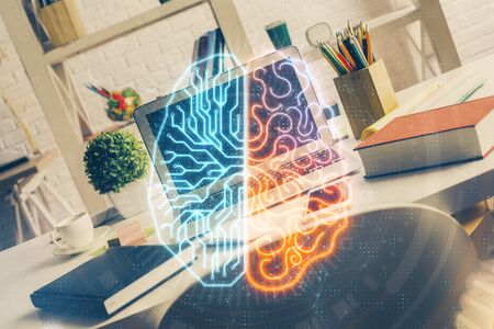 Double exposure of work space with computer and human brain drawing hologram. Brainstorm concept.
