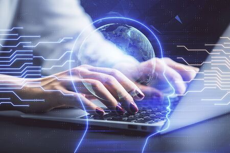 Multi exposure of woman hands working on computer and human brain hologram drawing. Ai tech concept.