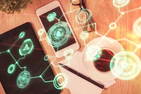 Double exposure of social network theme drawing over table with phone. Top view. People connecting...