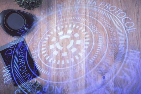Double exposure of technology theme drawing over work table desktop. Top view. Global data analysis concept.の写真素材