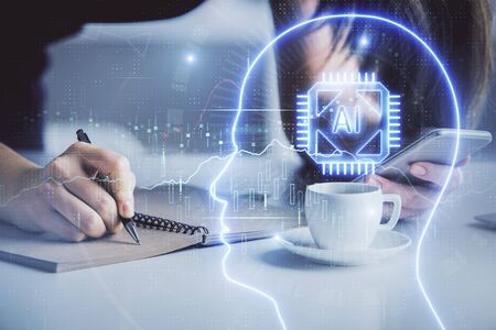 Double exposure of brain sketch hologram and woman holding and using a mobile device.