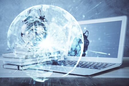 Double exposure of business theme icons and work space with computer background. Concept of success.の写真素材