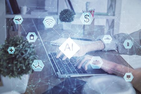 Double exposure of woman hands working on computer and data theme hologram drawing. Tech concept.の写真素材