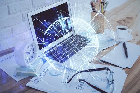 Double exposure of business theme icons and work space with computer background. Concept of success.の写真素材