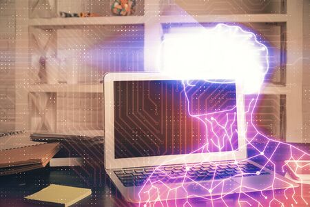 Computer on desktop with AR theme icon. Multi exposure. Concept of augmented reality.の写真素材