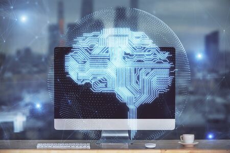 Double exposure of table with computer and brain hologram. Data innovation concept.の写真素材