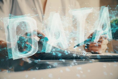 Multi exposure of hands making notes with digital coding icons. Computer learning concept.の写真素材