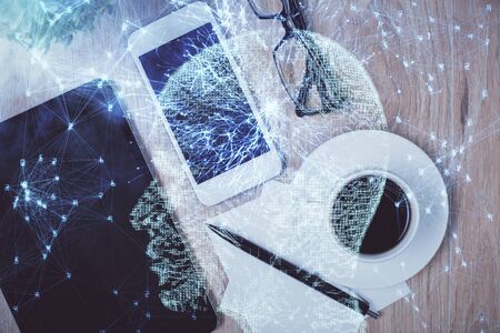 Multi exposure of brain drawing over work table desktop. Top view. Global data analysis concept.の写真素材