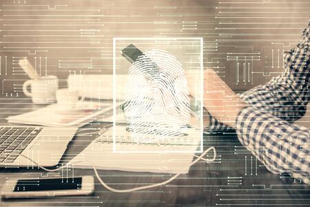 Double exposure of mans hands holding and using a digital device and fingerprint hologram drawing....