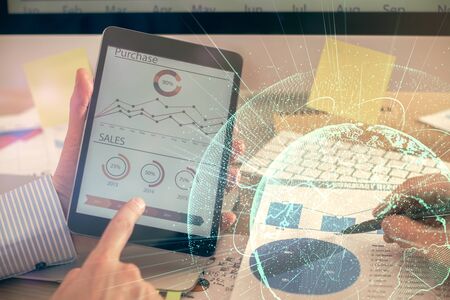 Double exposure of mans hands holding and using a phone and social network theme drawing.の写真素材