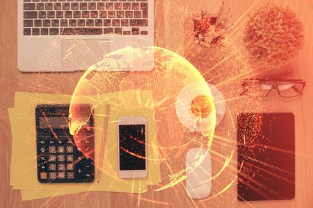 Double exposure of social network theme drawing over table with phone. Top view. People connecting concept.の写真素材