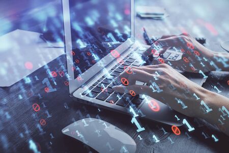Double exposure of woman hands working on computer and data theme hologram drawing. Tech concept.
