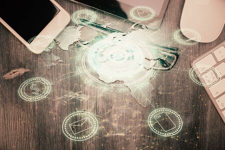 Double exposure of social network theme drawing over table with phone. Top view. People connecting concept.の写真素材