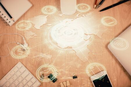 Double exposure of social network theme drawing over table with phone. Top view. People connecting...