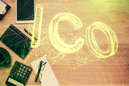Multi exposure of crypto theme drawing and work table top veiw. Concept of blockchain technology in...