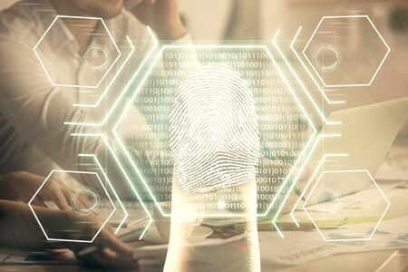 Double exposure of man and woman working together and fingerprint hologram drawing. Security...