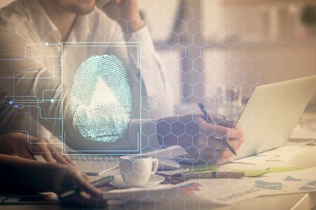 Double exposure of man and woman working together and fingerprint hologram drawing. Security...