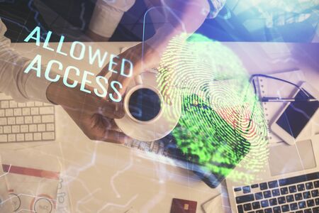 Double exposure of man and woman working together and fingerprint drawing. Computer background. Top...