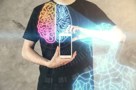 Double exposure of mans hands holding and using a digital device and AR glasses drawing.の写真素材
