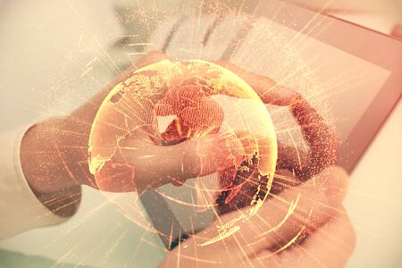 Double exposure of mans hands holding and using a phone and social network theme drawing.の写真素材