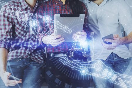 Double exposure of data theme hologram drawing and man and woman working together holding and using...