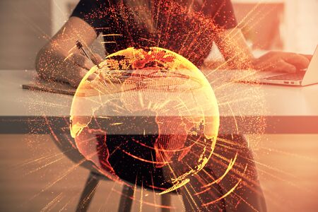 Double exposure of woman hands typing on computer and social network theme hologram drawing. People media concept.の写真素材