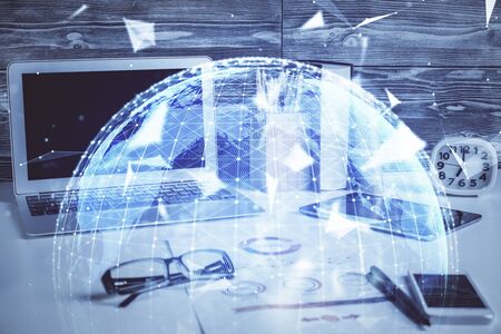 Double exposure of business theme icons and work space with computer background. Concept of success.の写真素材