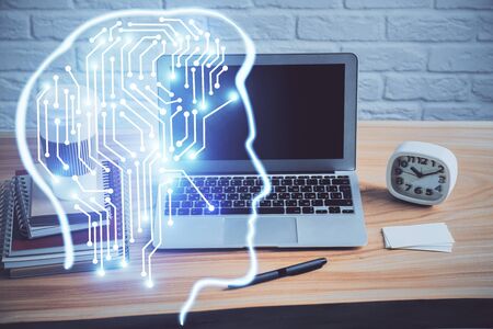 Double exposure of table with computer and brain hologram. Data innovation concept.の写真素材