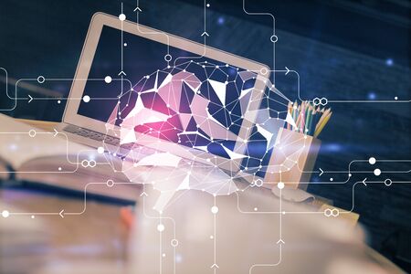Multi exposure of work space with computer and human brain hologram. Brainstorm concept.