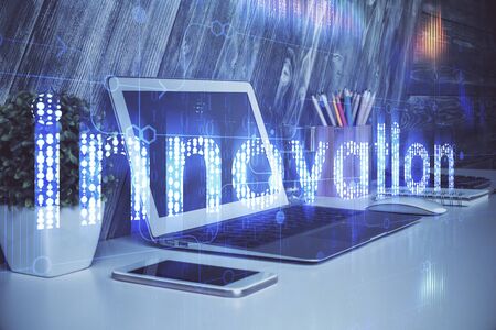 Multi exposure of computer on background and technology theme drawing. Concept of innovation.の写真素材