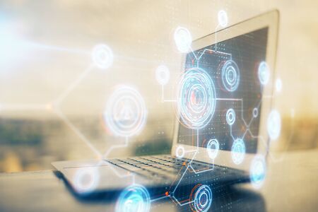Double exposure of desktop with computer on background and tech theme drawing. Concept of big data.