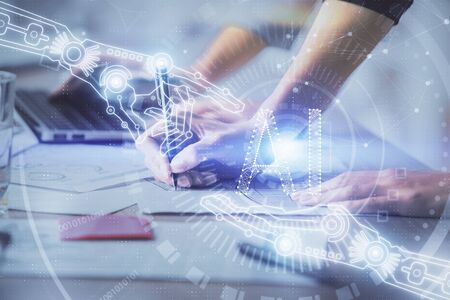 Double exposure of woman hands working on computer and data theme hologram drawing. Tech concept.