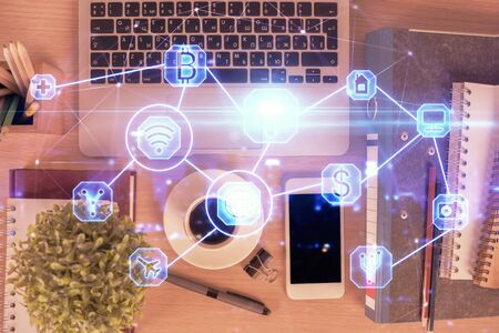 Double exposure of social network theme drawing over table with phone. Top view. People connecting concept.の写真素材