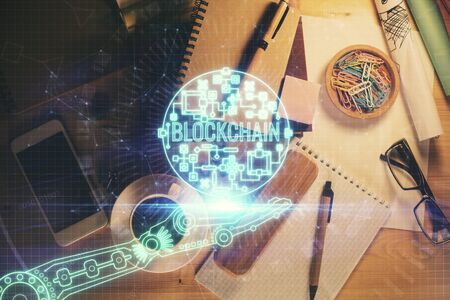 Multi exposure of crypto theme drawing and work table top veiw. Concept of blockchain technology in business.の写真素材