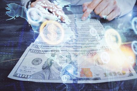 Multi exposure of forex graph drawing hologram and USA dollars bills and man hands. Technical Analysis concept.の写真素材