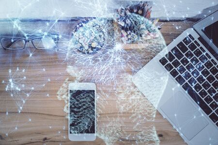 Double exposure of brain drawing over work table desktop. Top view. Global data analysis concept.の写真素材