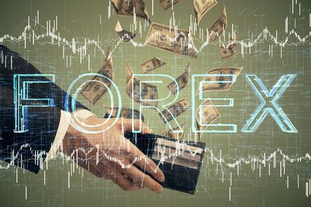 Multi exposure of financial graph drawing hologram and USA dollars bills and man hands. Analysis concept.の写真素材