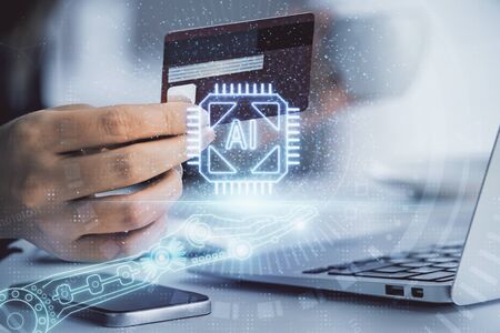 Double exposure of woman on-line shopping holding a credit card and data theme hologram drawing....