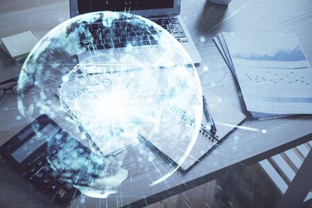 Double exposure of business theme icons and work space with computer background. Concept of success.の写真素材