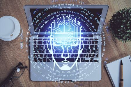 Multi exposure of work table with computer and brain hologram. Brainstorm concept.の写真素材