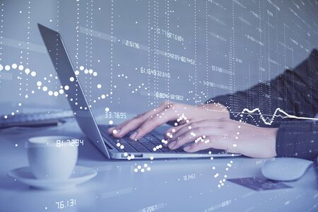 Multi exposure of woman hands working on computer and data theme hologram drawing. Tech concept.