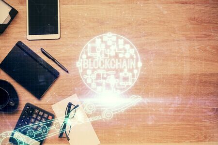 Multi exposure of crypto theme drawing and work table top veiw. Concept of blockchain technology in business.の写真素材