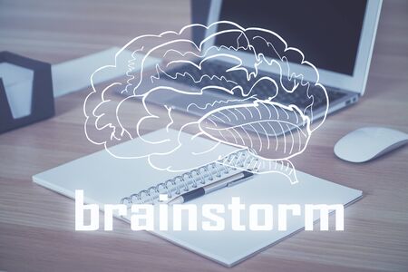 Desktop computer background in office and start up theme hologram drawing. Double exposure. Startup...
