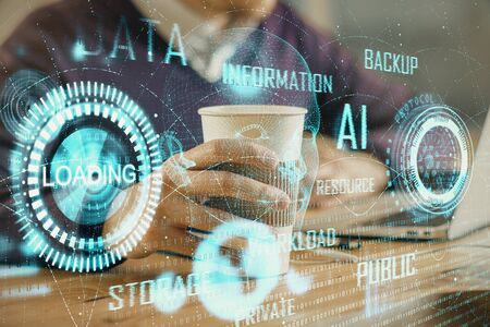 Double exposure of data internet theme hologram with man working on computer on background. Concept of innovation.の写真素材